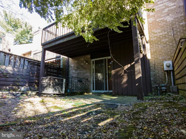 a front view of a house with stairs