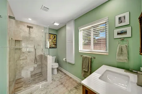 a room with furniture and a wooden floor