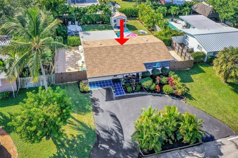 a outdoor view of the house and swimming pool