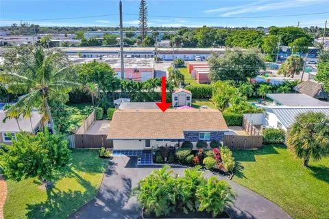 a view of a backyard of the house