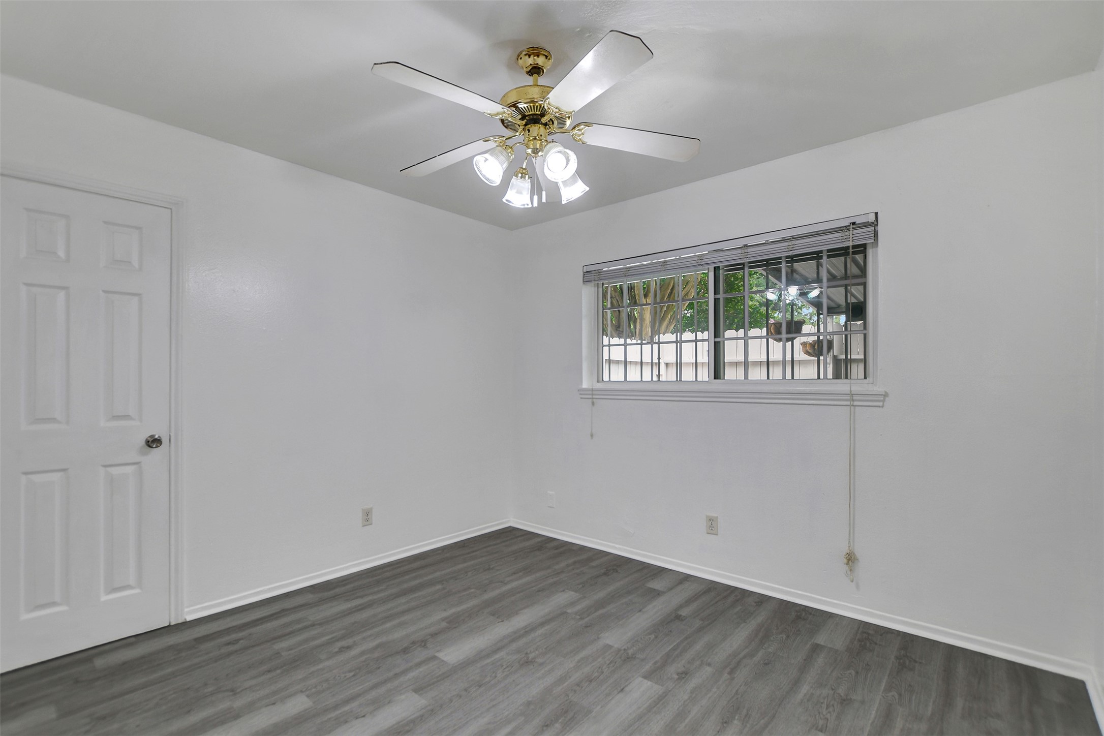 9436 Neuens Road, Unit 9436 Houston, TX 77080 - Photo 16 of 17 another view of secondary bedroom with view of the patio