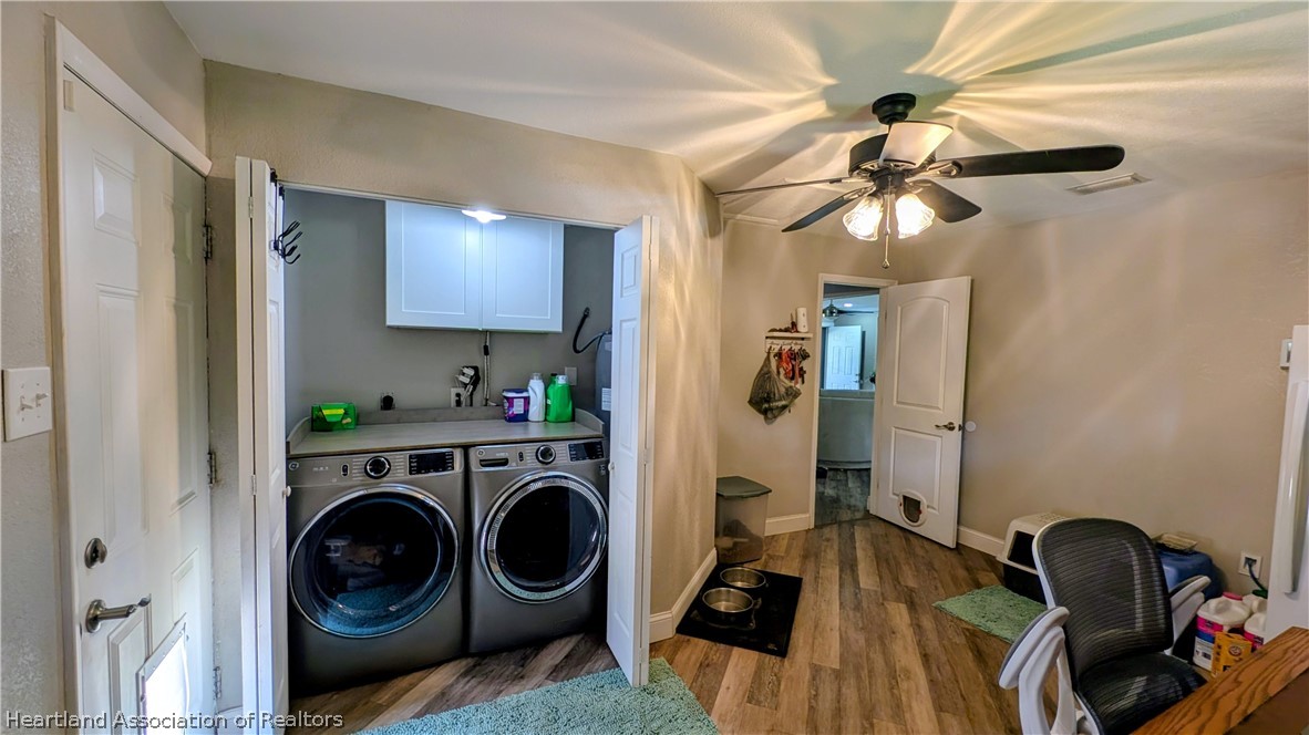 6218 Apple Road Sebring, FL 33875 - Photo 25 of 40 a view of a room with washer and dryer