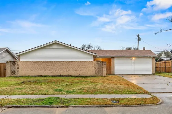 a view of a big yard next to a yard
