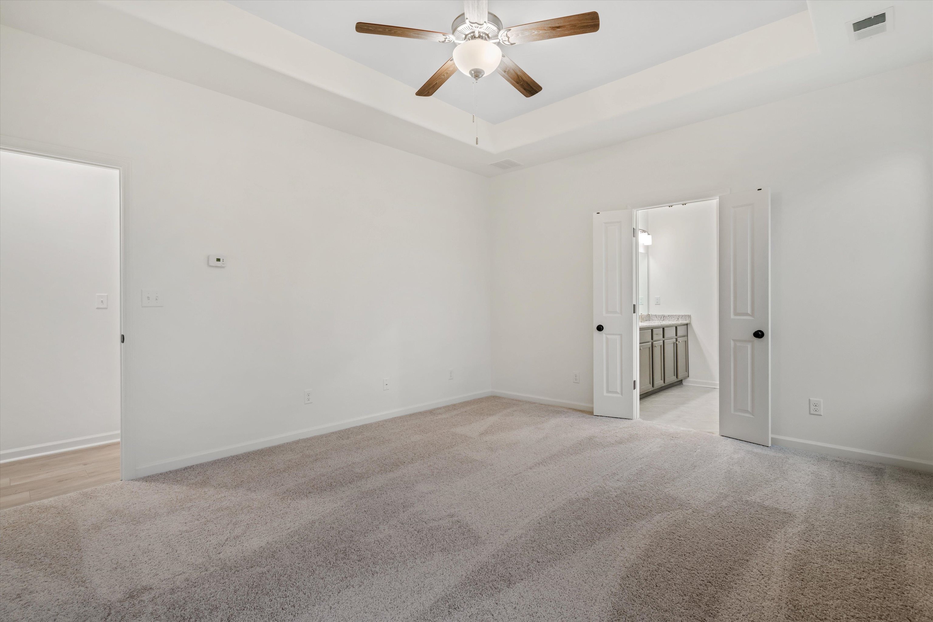 300 Maple Street Oakland, TN 38060 - Photo 17 of 27 a view of an empty room and chandelier fan