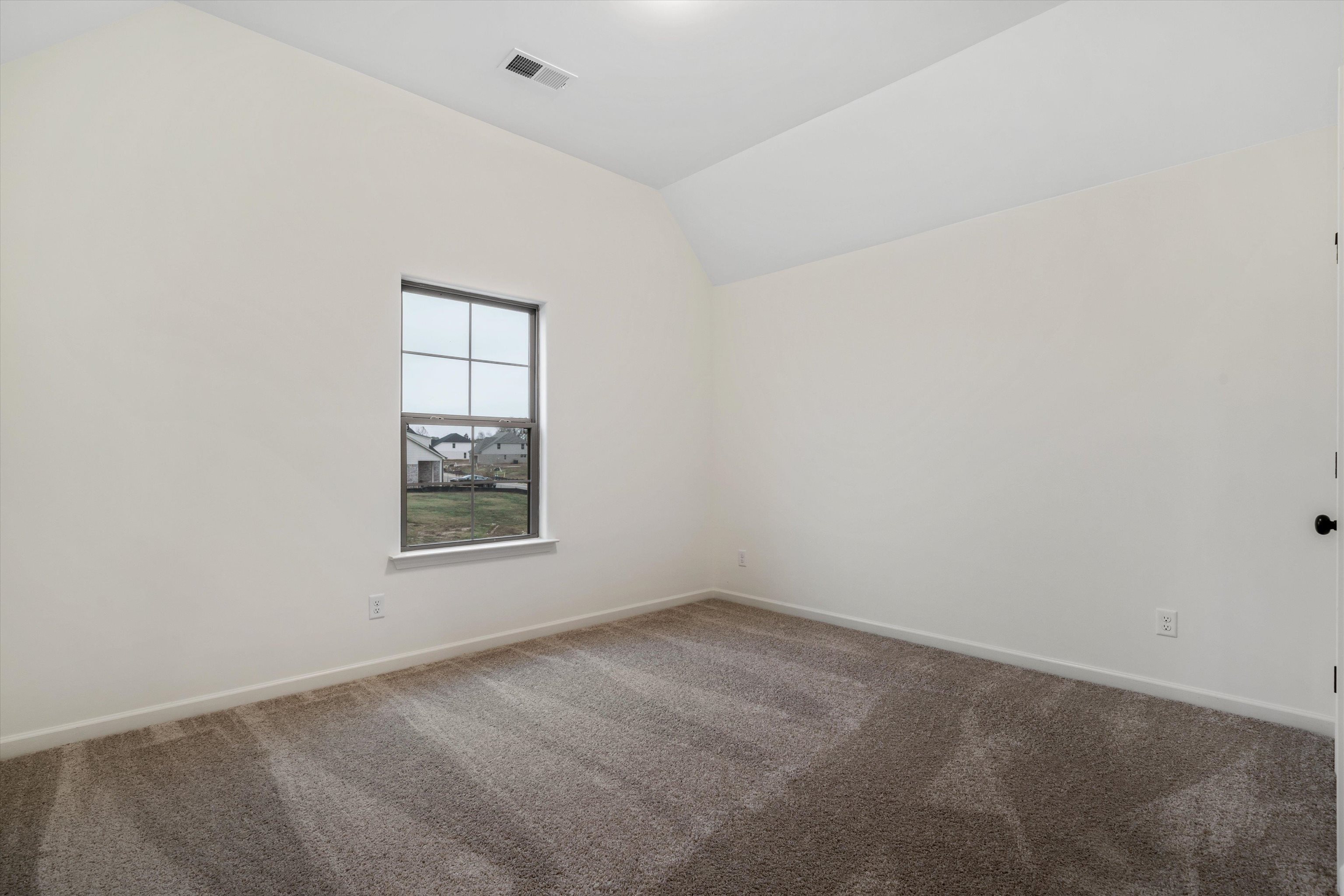 300 Maple Street Oakland, TN 38060 - Photo 23 of 27 an empty room with a window