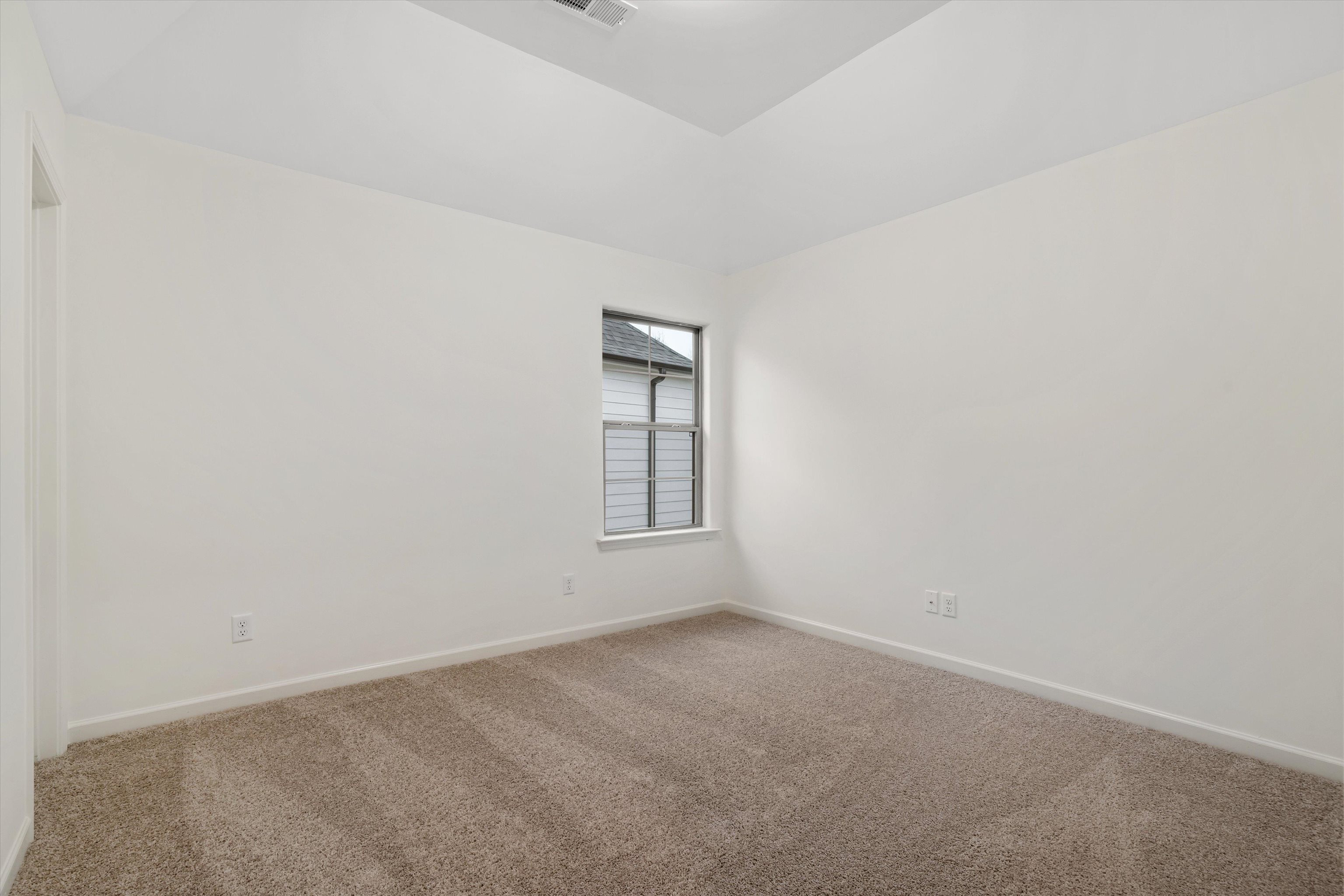 300 Maple Street Oakland, TN 38060 - Photo 25 of 27 an empty room with a window