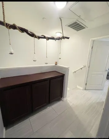 a bathroom with a sink and mirror