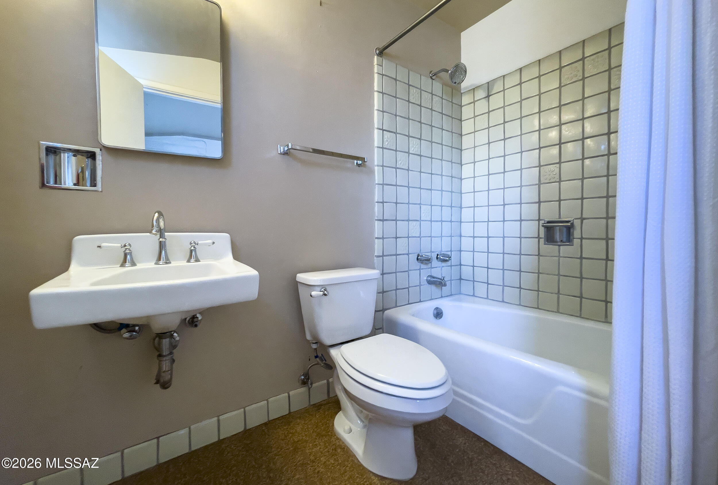 4130 East River Road Tucson, AZ 85718 - Photo 23 of 46 a bathroom with a sink a toilet and bathtub