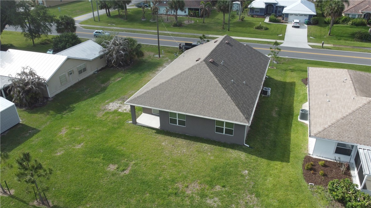 1836 Barber Street Sebastian, FL 32958 - Photo 7 of 29 an aerial view of a house with a yard