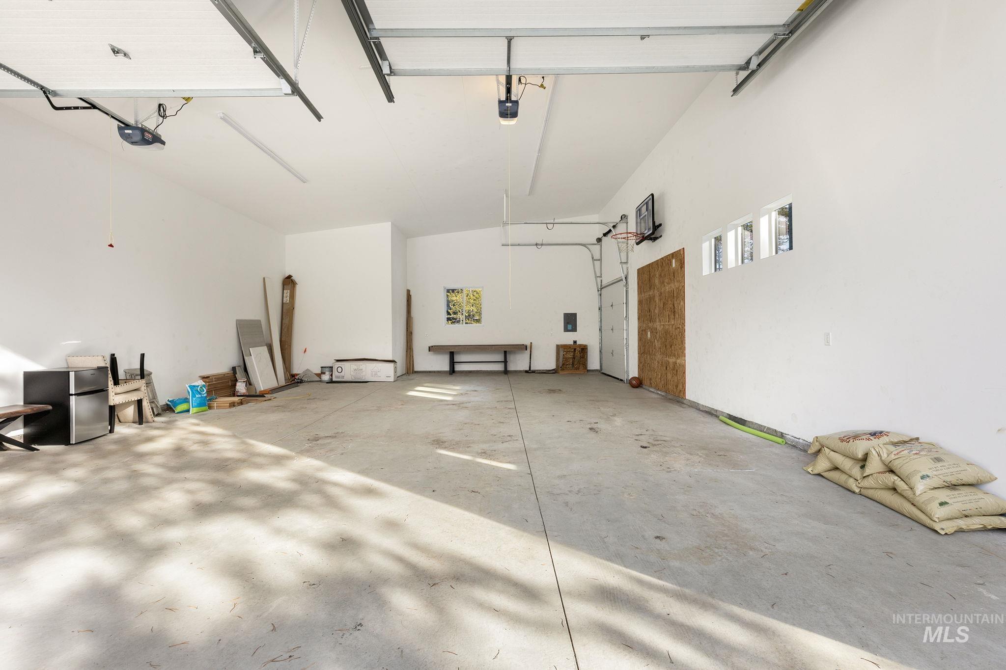 127 Jacks Loop Donnelly, ID 83615 - Photo 32 of 46 Garage featuring freestanding refrigerator