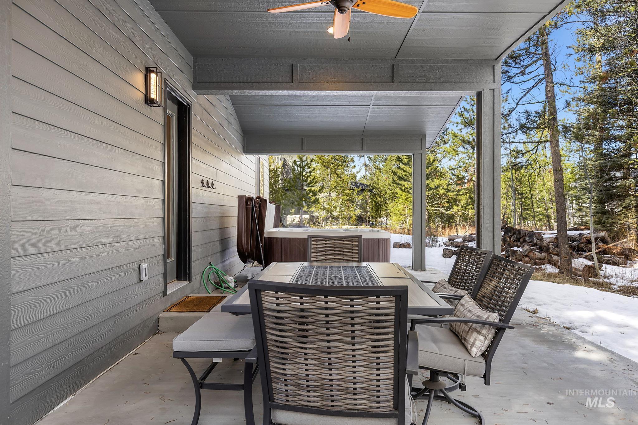 127 Jacks Loop Donnelly, ID 83615 - Photo 34 of 46 View of patio / terrace with outdoor dining area and ceiling fan