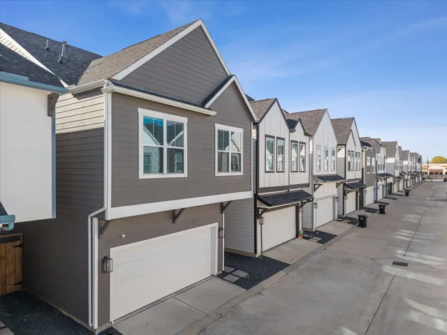 a view of a house with a street