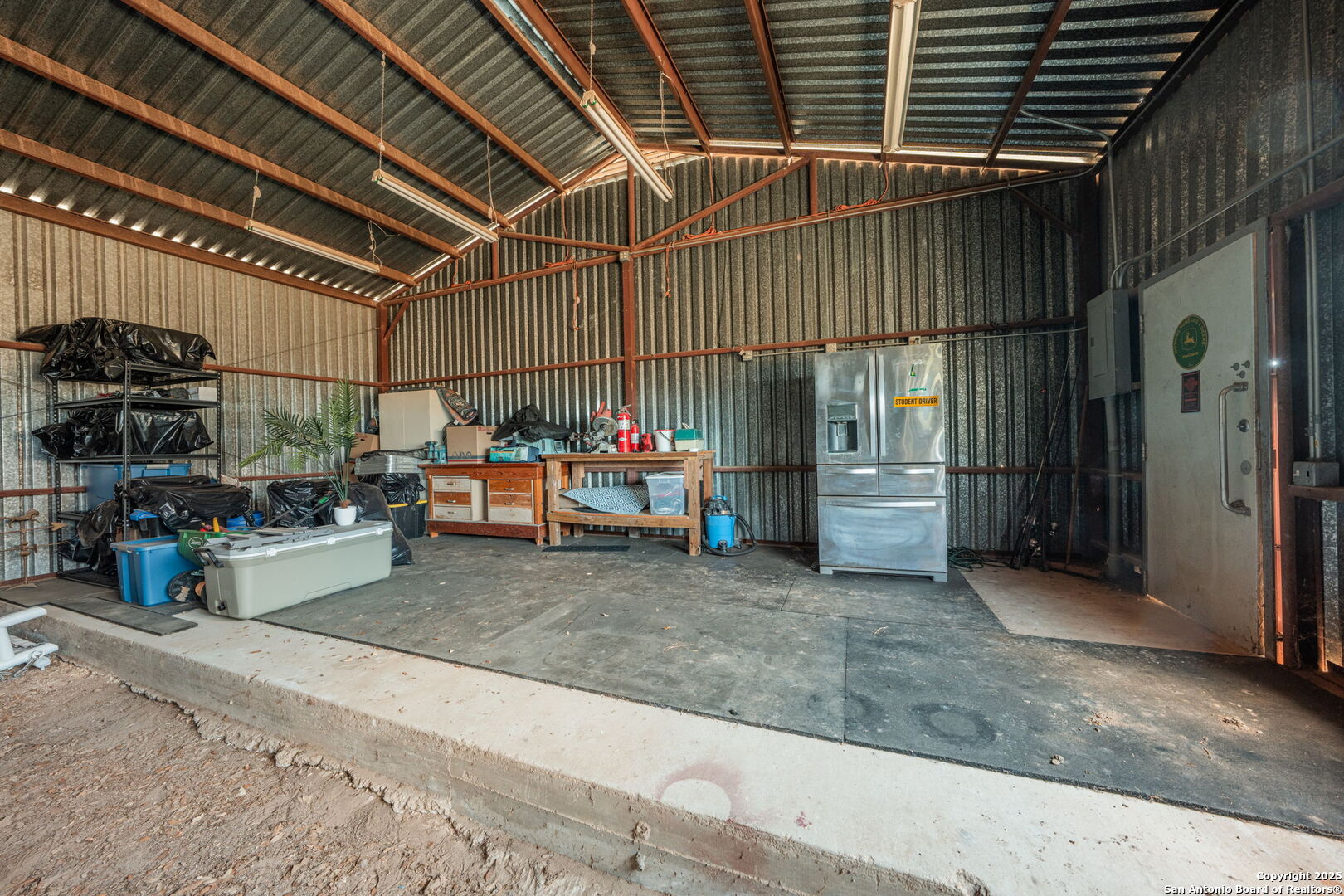 1700 Bruce Road Poteet, TX 78065 - Photo 16 of 46 a view of storage and utility room