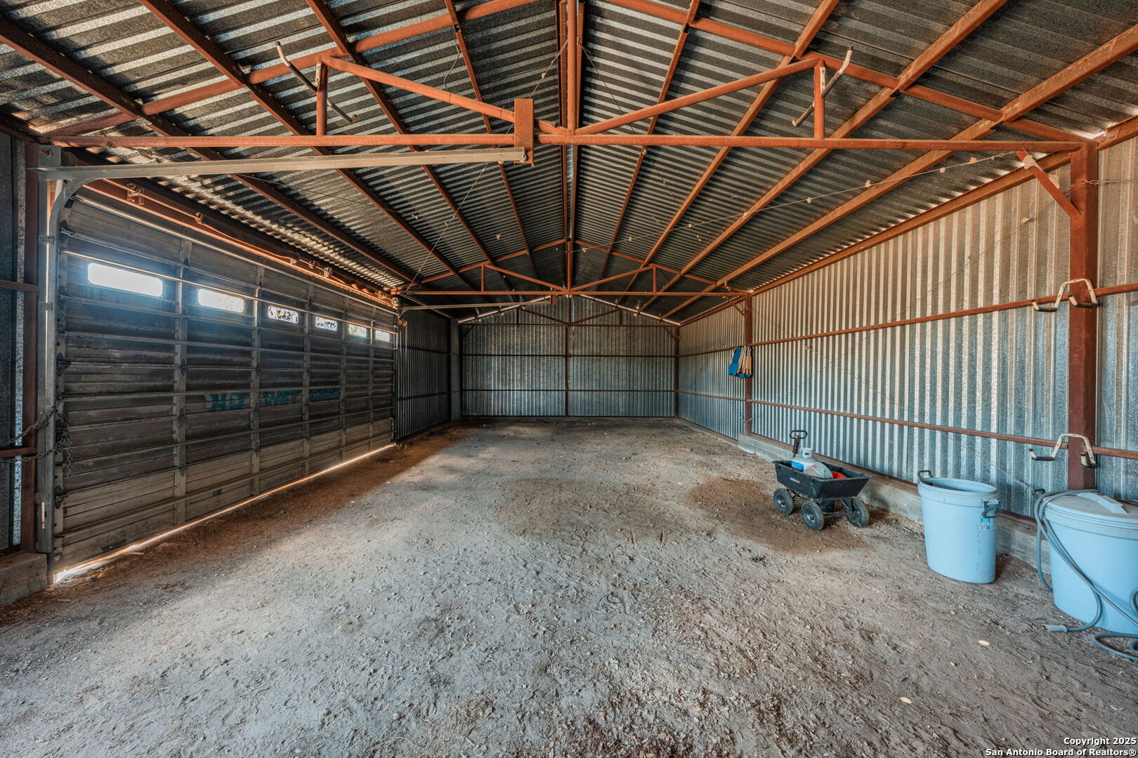 1700 Bruce Road Poteet, TX 78065 - Photo 17 of 46 a view of an empty room with wooden fence