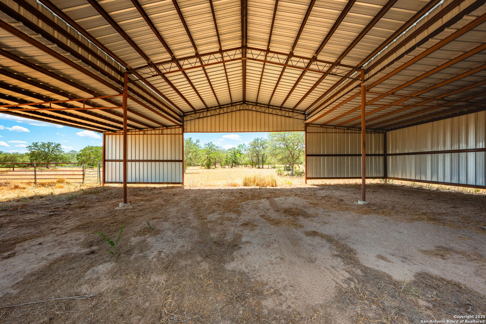 1700 Bruce Road Poteet, TX 78065 - Photo 23 of 46 a view of empty room with wooden floor