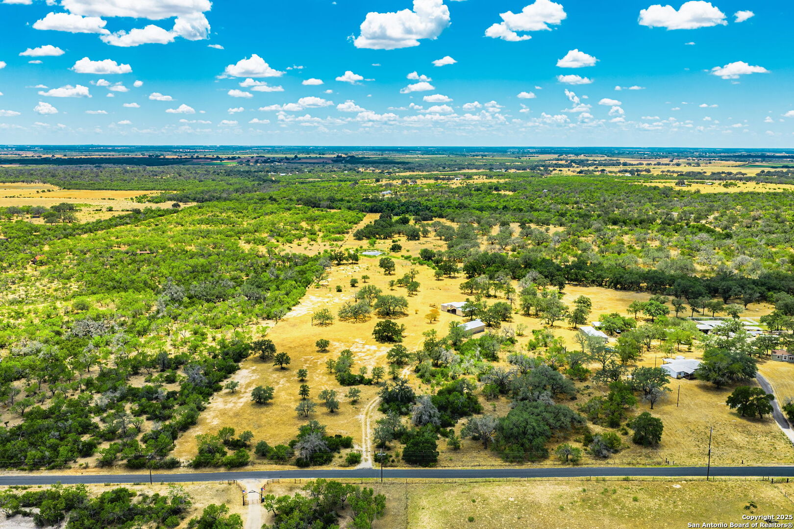 1700 Bruce Road Poteet, TX 78065 - Photo 5 of 46 a view of an ocean and a yard