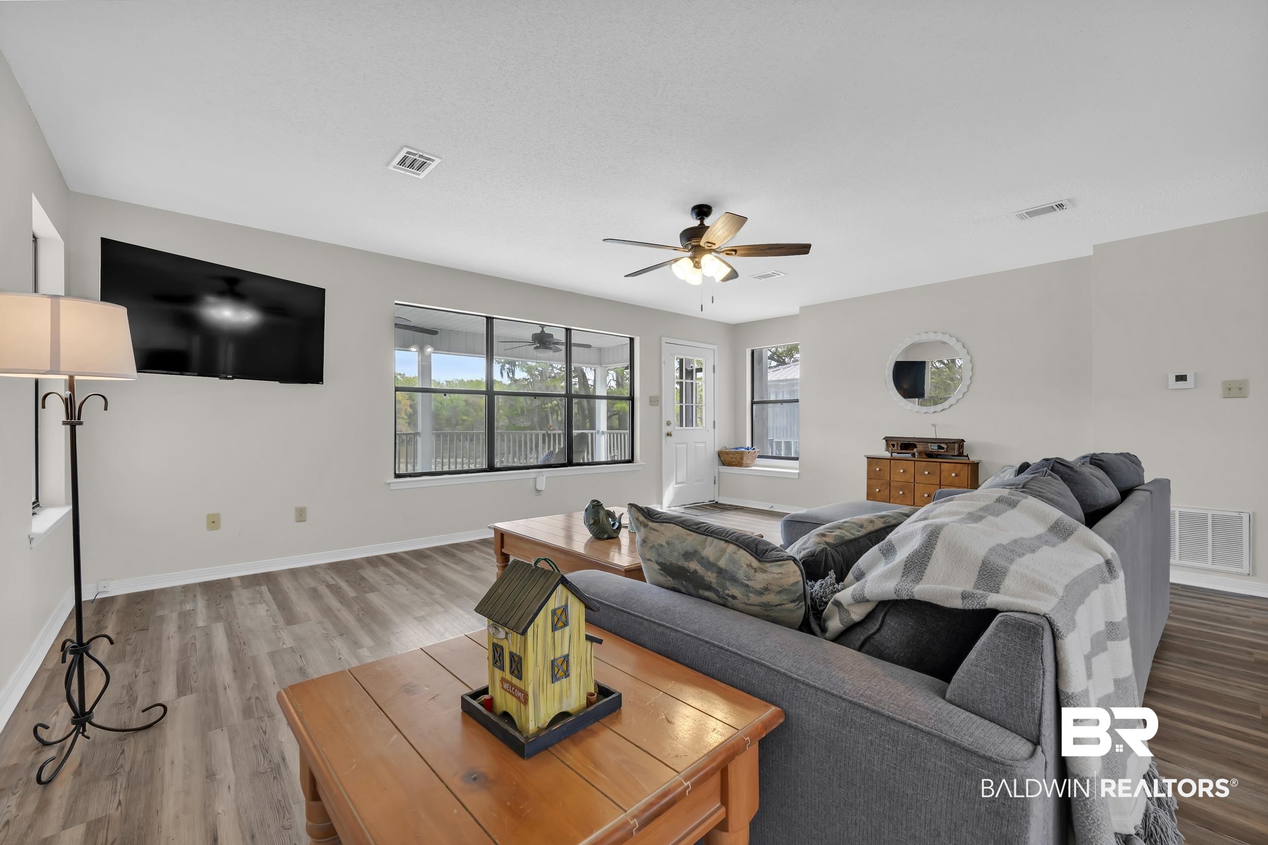8081 Bryant's Lndg Road Stockton, AL 36579 - Photo 19 of 48 Living room featuring plenty of natural light, light wood-type flooring, and ceiling fan