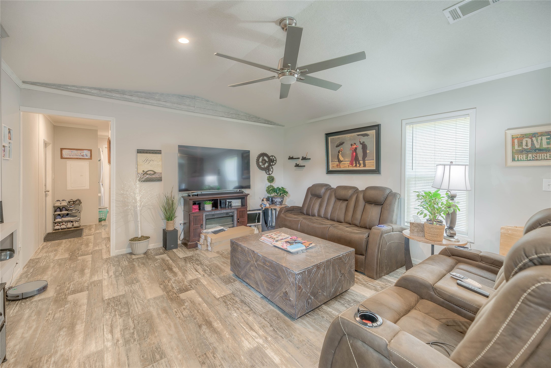 363 Deer Run Road Trinity, TX 75862 - Photo 16 of 28 a living room with furniture and a flat screen tv
