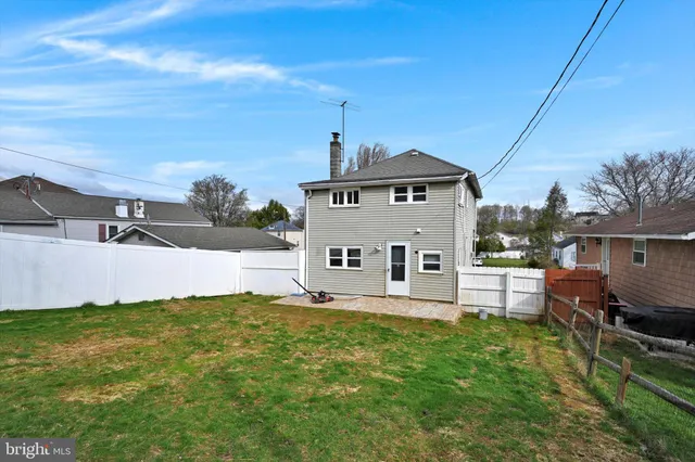 a view of a house with a big yard