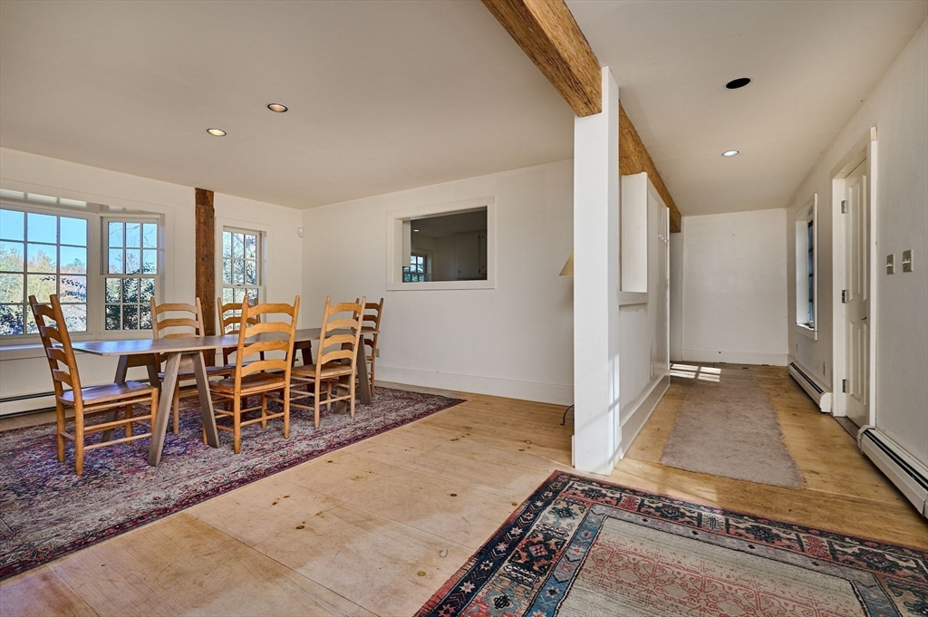 41 Buckland Road Hawley, MA 01339 - Photo 12 of 42 a view of a livingroom with furniture and window