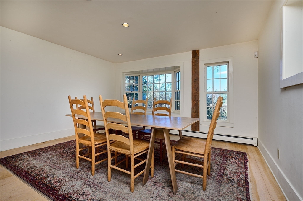 41 Buckland Road Hawley, MA 01339 - Photo 13 of 42 a view of a dining room with furniture window and wooden floor