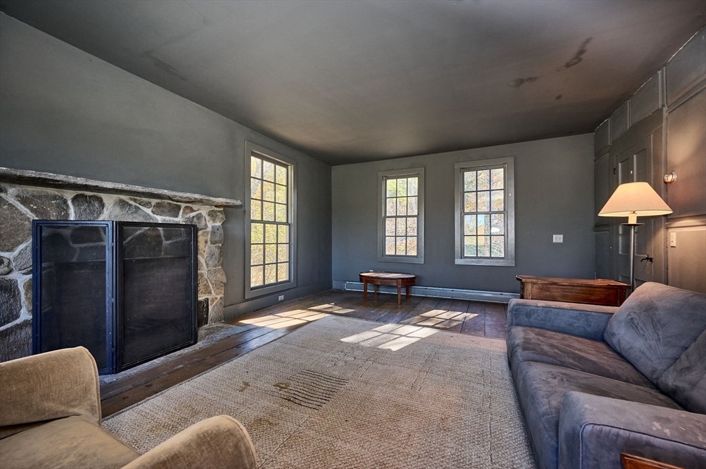 41 Buckland Road Hawley, MA 01339 - Photo 18 of 42 a living room with furniture and a window