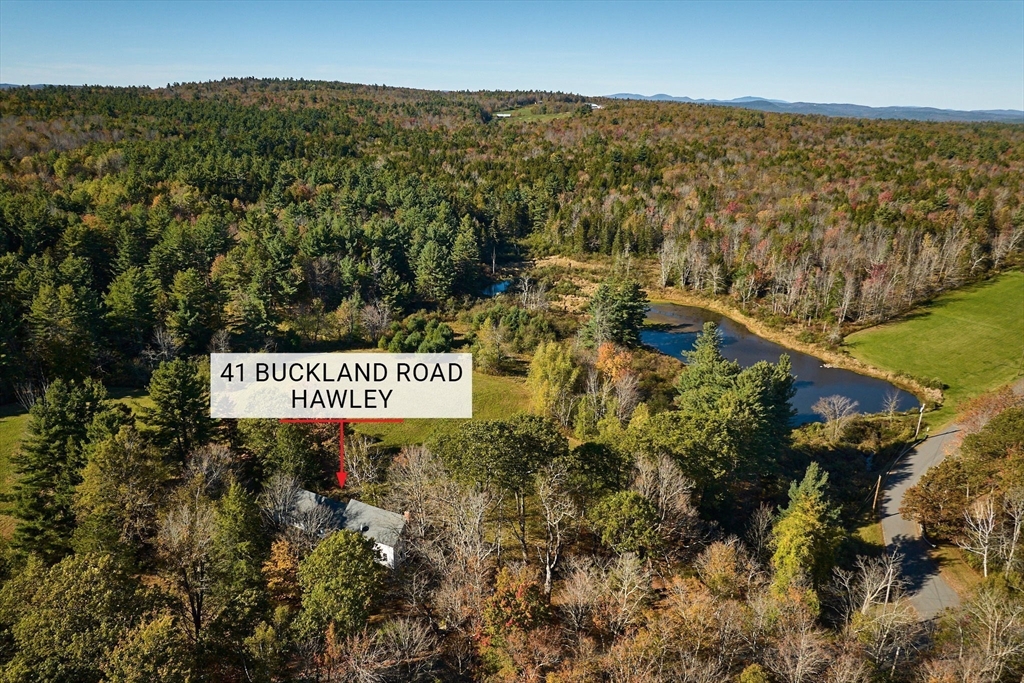 41 Buckland Road Hawley, MA 01339 - Photo 31 of 42 a view of a sign board with lake view
