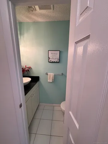a bathroom with a sink and toilet
