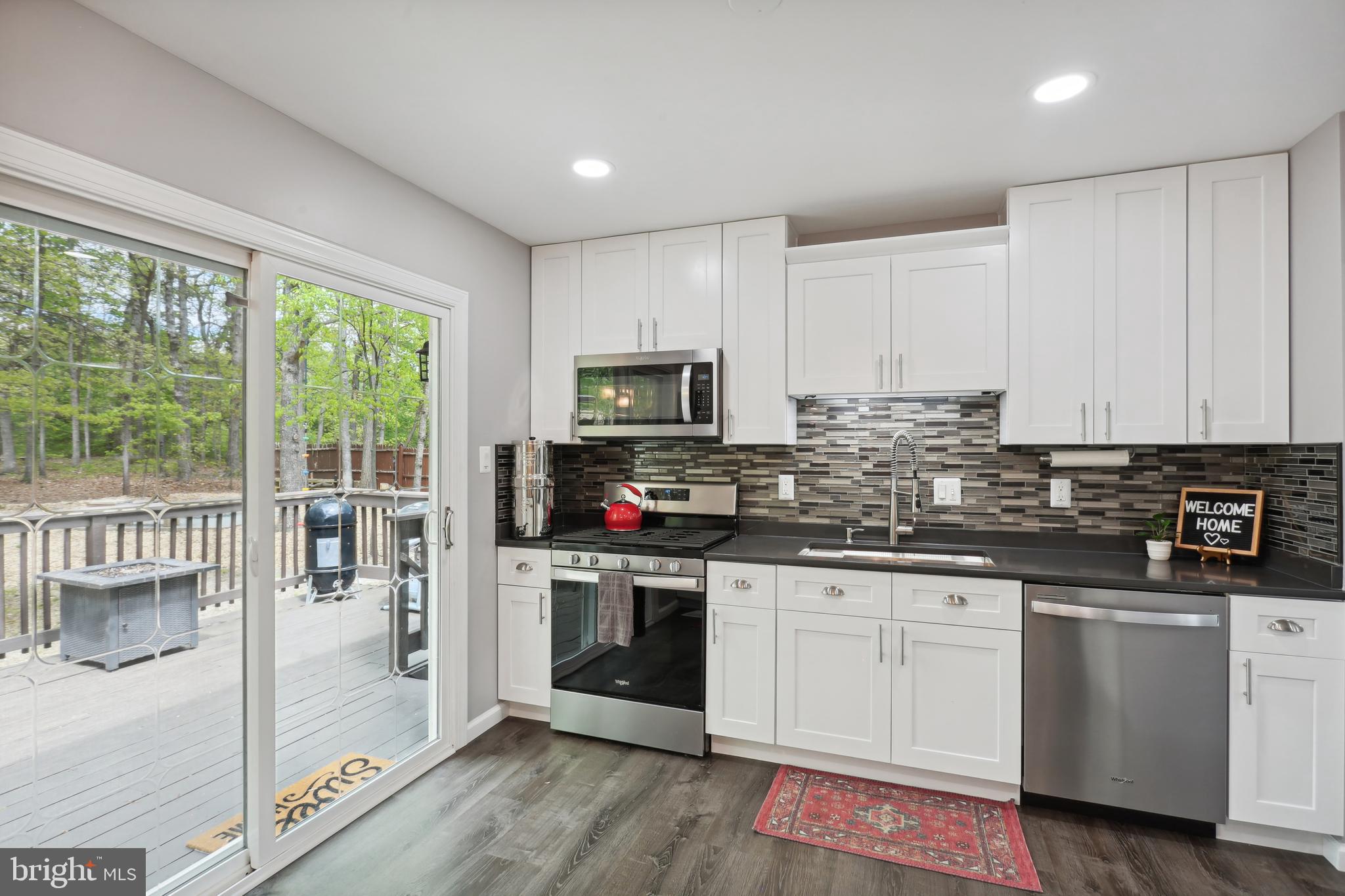 8922 Applecross Lane Springfield, VA 22153 - Photo 7 of 25 Kitchen: opens into private deck