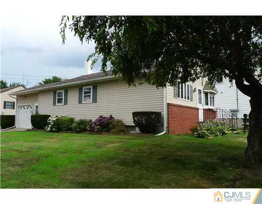 101 Stelton Road Piscataway, NJ 08854 - Photo 2 of 13 a view of an house with backyard space and garden