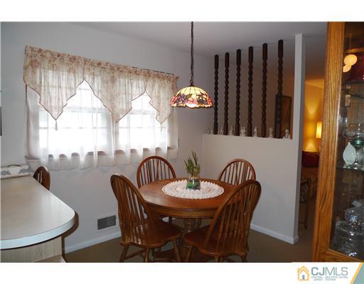101 Stelton Road Piscataway, NJ 08854 - Photo 6 of 13 a dining room with furniture and window