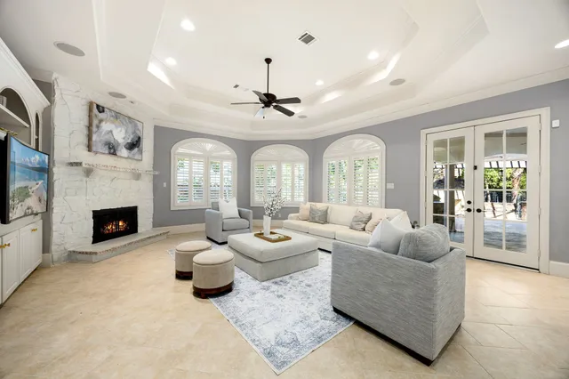 an aerial view of a house with swimming pool and outdoor space