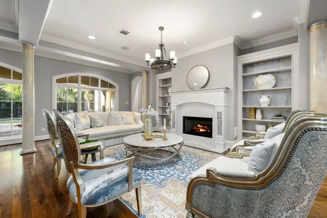 a kitchen with sink a stove and cabinets