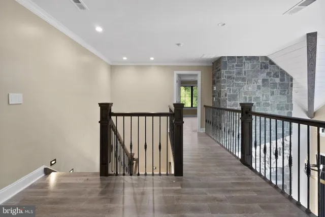 a bathroom with a shower and toilet