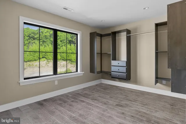a utility room with sink dryer and washer