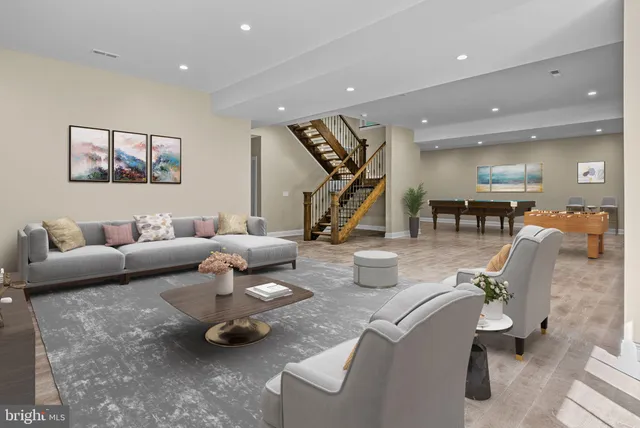 a front view of a house with a yard and fountain in middle