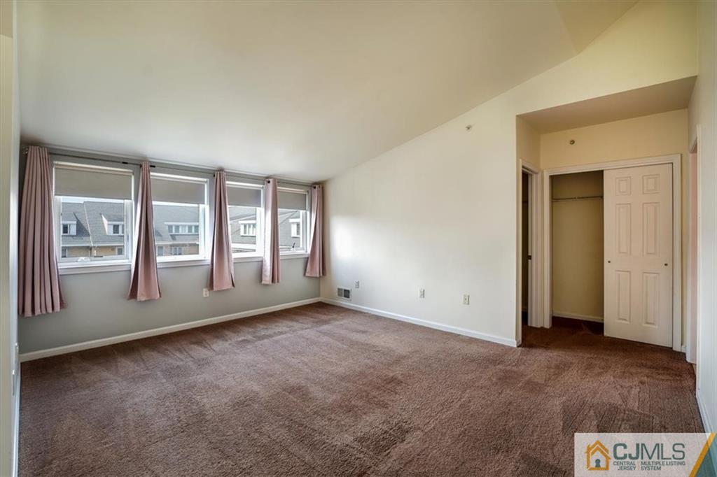 368 Rector Street, Unit 511 Perth Amboy, NJ 08861 - Photo 13 of 16 a view of an empty room with a window