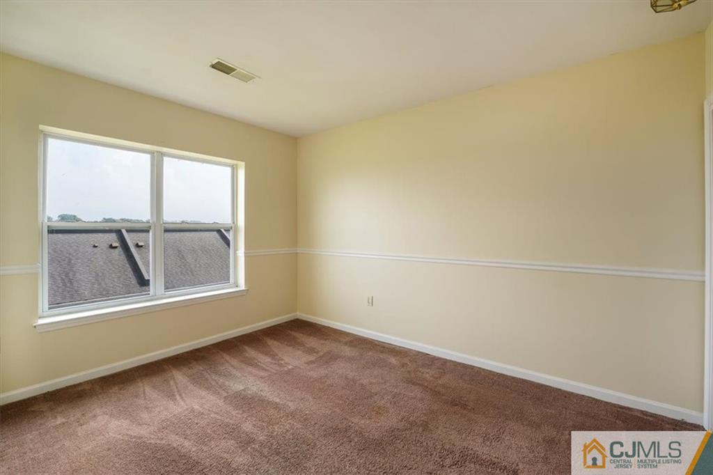 368 Rector Street, Unit 511 Perth Amboy, NJ 08861 - Photo 10 of 16 an empty room with a window