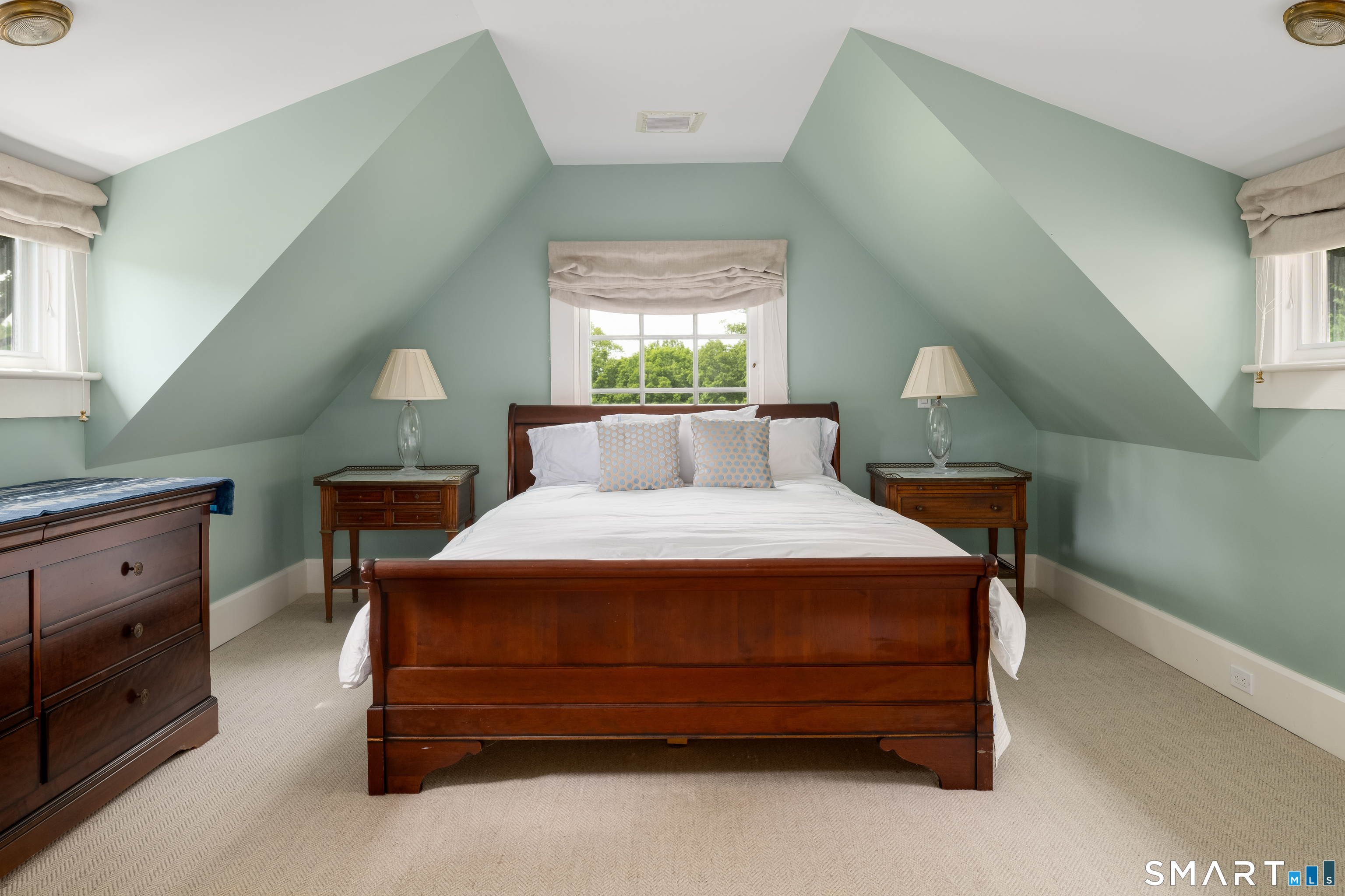 240 Umpawaug Road Redding, CT 06896 - Photo 25 of 40 Bedroom on 3rd level. Wall-to-wall carpeting, vaulted ceiling.