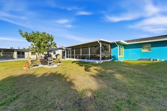 a view of a house with a big yard