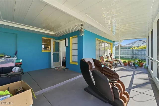 a view of a livingroom with furniture and windows