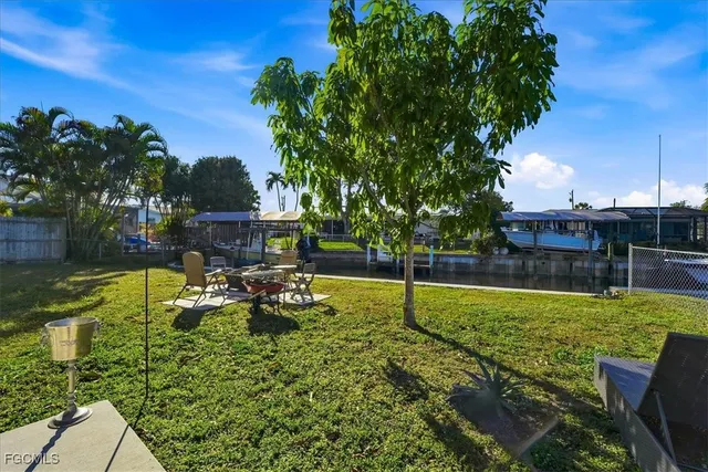 a view of a swimming pool with chairs
