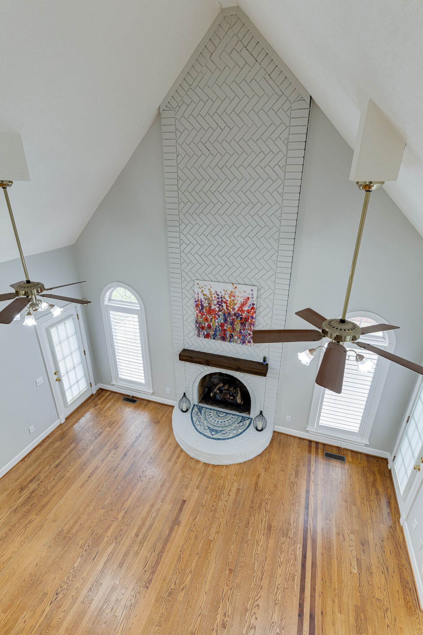 115 Rock Bridge Road Gallatin, TN 37066 - Photo 16 of 70 a view of an empty room with wooden floor