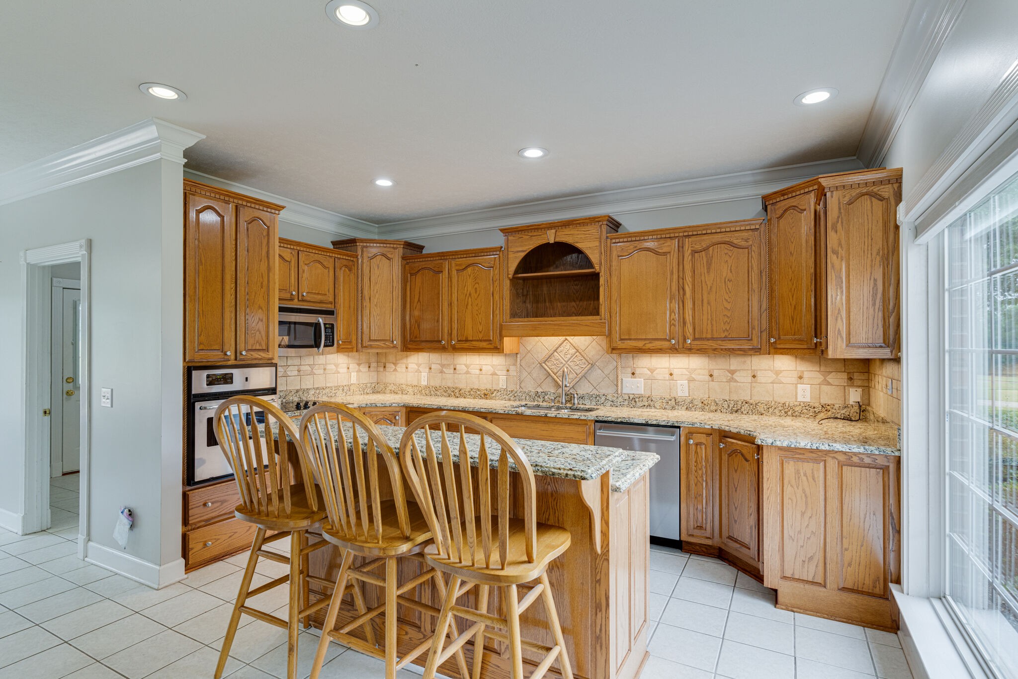 115 Rock Bridge Road Gallatin, TN 37066 - Photo 19 of 70 a kitchen with a sink and cabinets