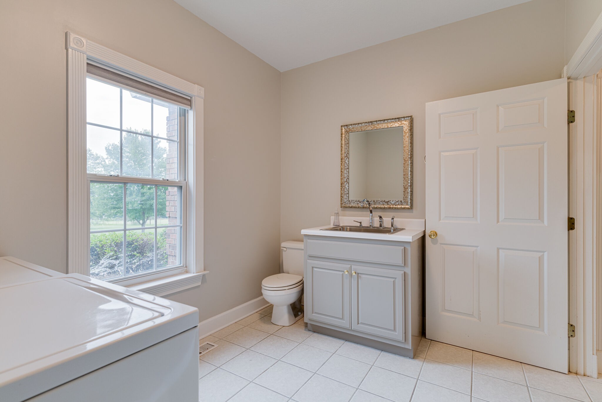 115 Rock Bridge Road Gallatin, TN 37066 - Photo 25 of 70 a bathroom with a sink toilet and window