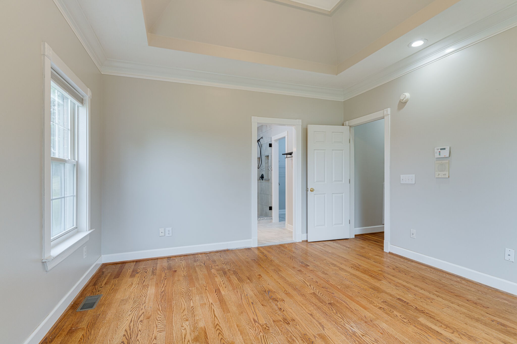 115 Rock Bridge Road Gallatin, TN 37066 - Photo 26 of 70 a view of empty room with wooden floor and fan