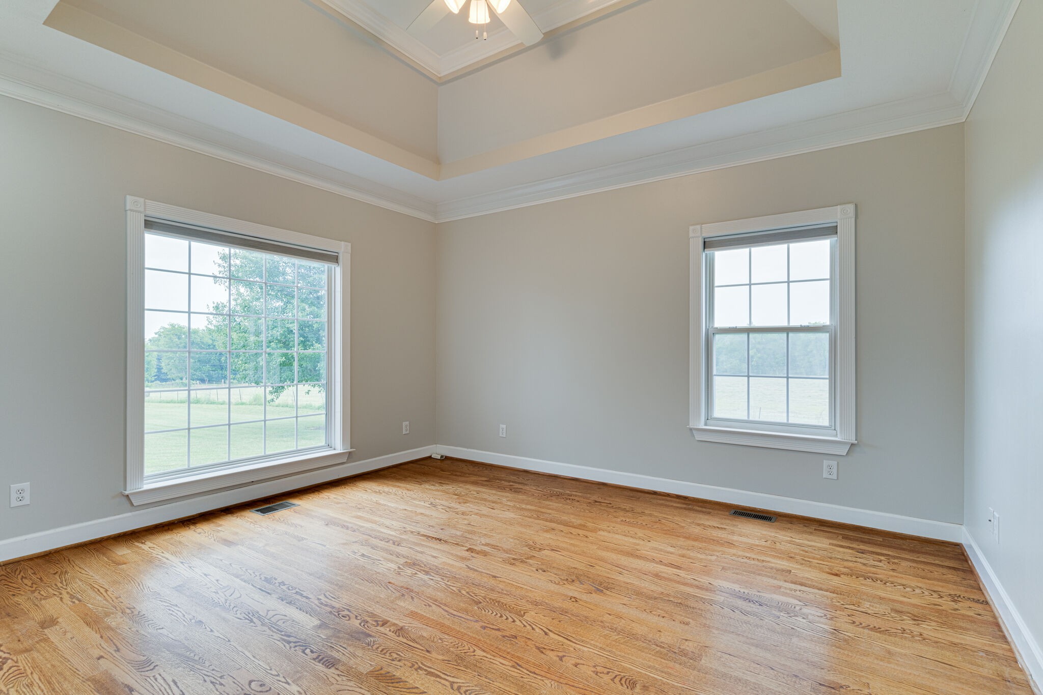 115 Rock Bridge Road Gallatin, TN 37066 - Photo 28 of 70 an empty room with wooden floor and windows