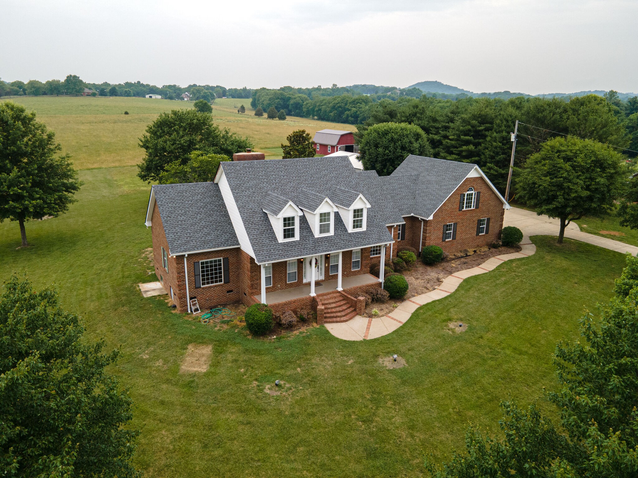 115 Rock Bridge Road Gallatin, TN 37066 - Photo 3 of 70 an aerial view of a house with garden space and lake view