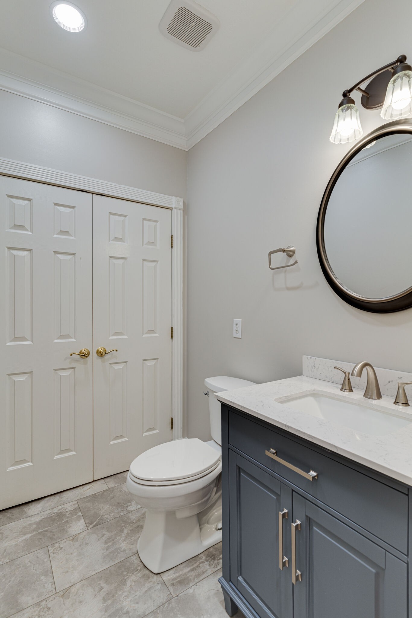 115 Rock Bridge Road Gallatin, TN 37066 - Photo 33 of 70 a bathroom with a toilet a sink and mirror