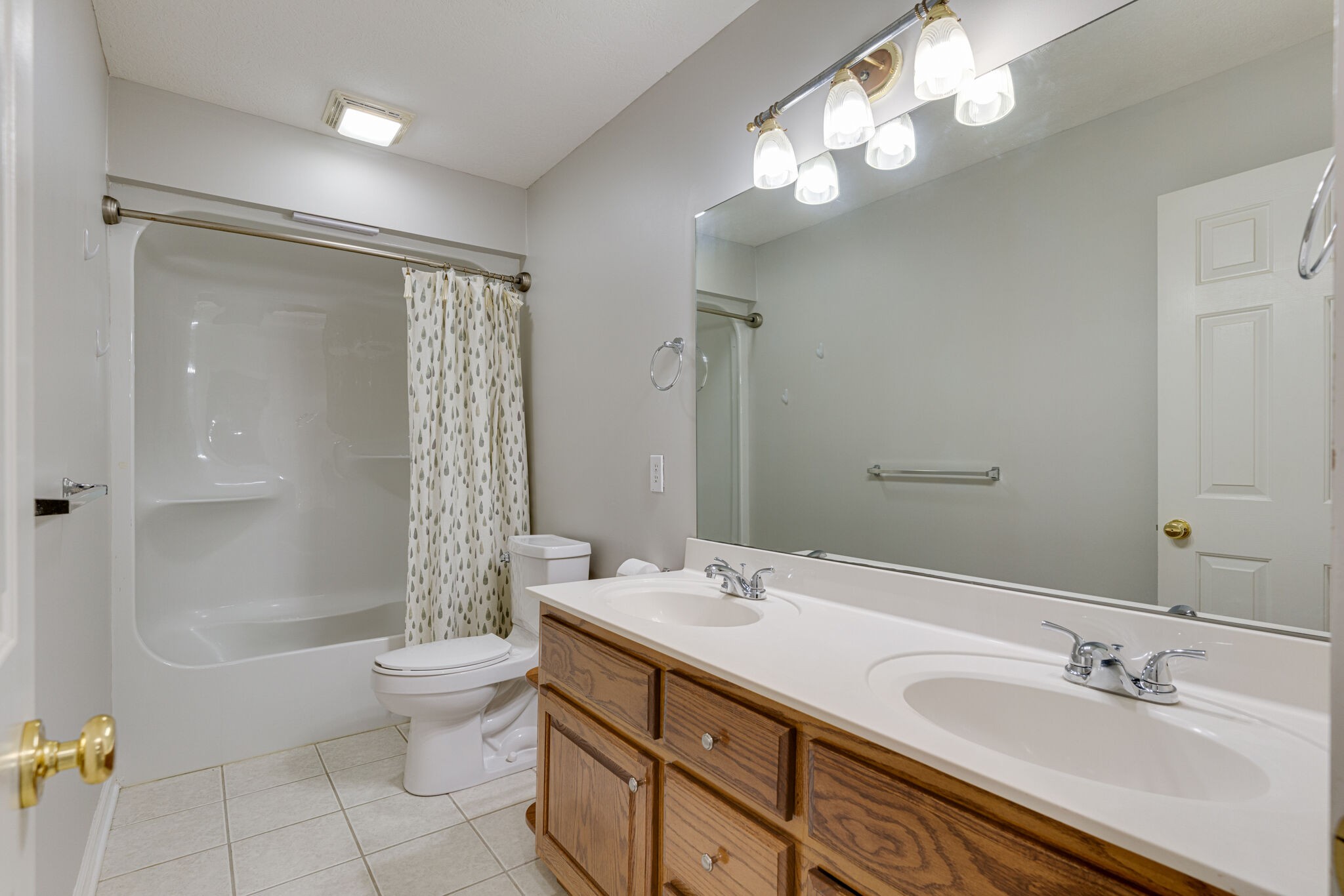 115 Rock Bridge Road Gallatin, TN 37066 - Photo 41 of 70 a bathroom with a double vanity sink mirror and toilet